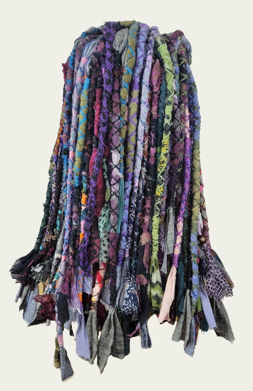 ​ Boho couture crown made with handmade fabric dread wraps. Styled as a temporary loc look without synthetic extensions.